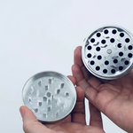 Silver chrome grinder showing grinding teeth